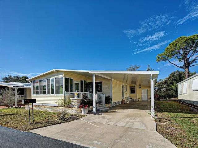 a view of a house with a patio