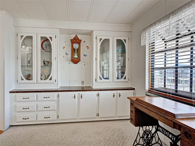 a bed room with a bed and a television