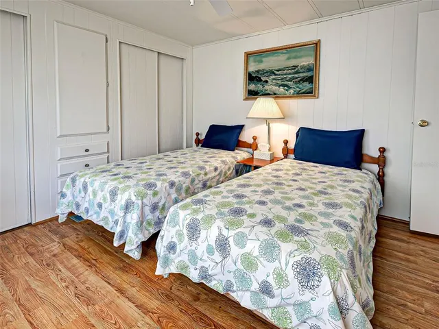 a view of a house with swimming pool and sitting area