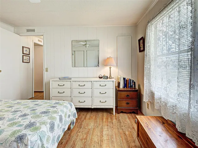 a view of a swimming pool with outdoor seating