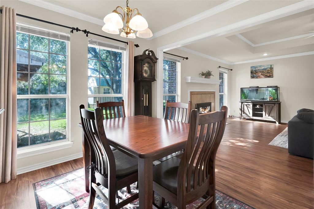 2510 Holiday Street Denison, TX 75020 - Photo 14 of 30 a view of a dining room with furniture window and wooden floor