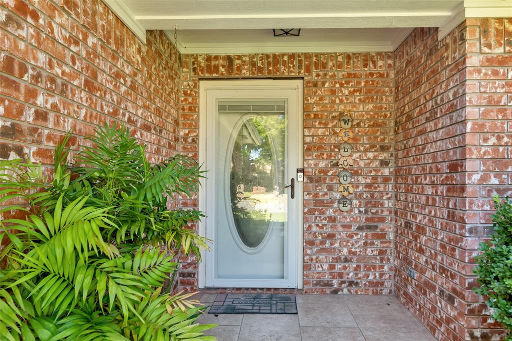2510 Holiday Street Denison, TX 75020 - Photo 3 of 30 a front view of a house with a window