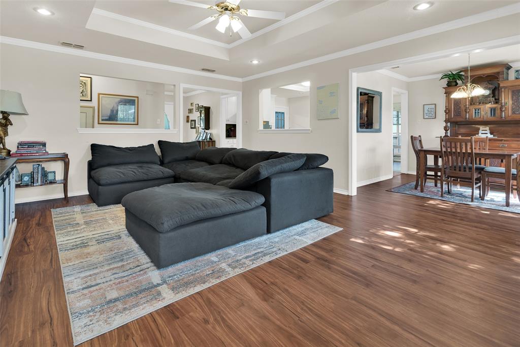 2510 Holiday Street Denison, TX 75020 - Photo 8 of 30 a living room with furniture and a wooden floor