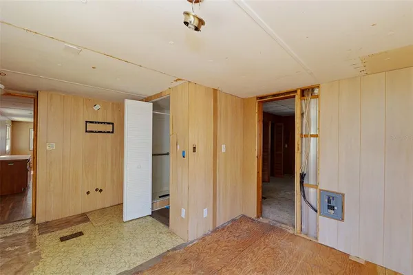 a view of hallway with bathroom
