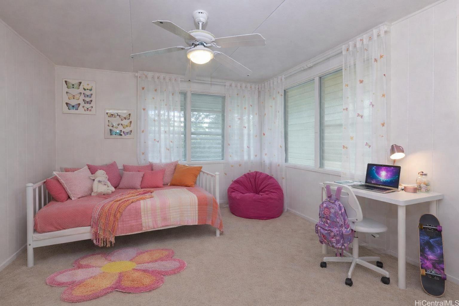 176 Kuulei Road Kailua, HI 96734 - Photo 12 of 24 Bedroom # 4 located at the front of the home, it looks out to the front yard. The room has been virtually staged.