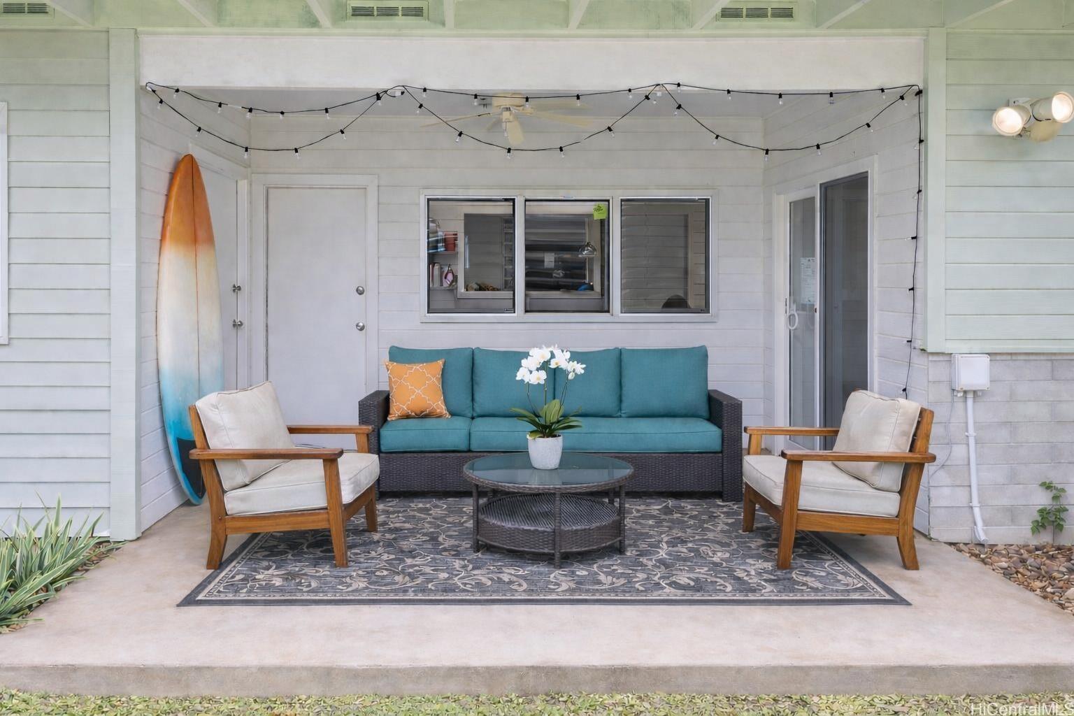 176 Kuulei Road Kailua, HI 96734 - Photo 18 of 24 Covered lanai area is a great place to gather and relax. Outdoor area has been virtually staged.