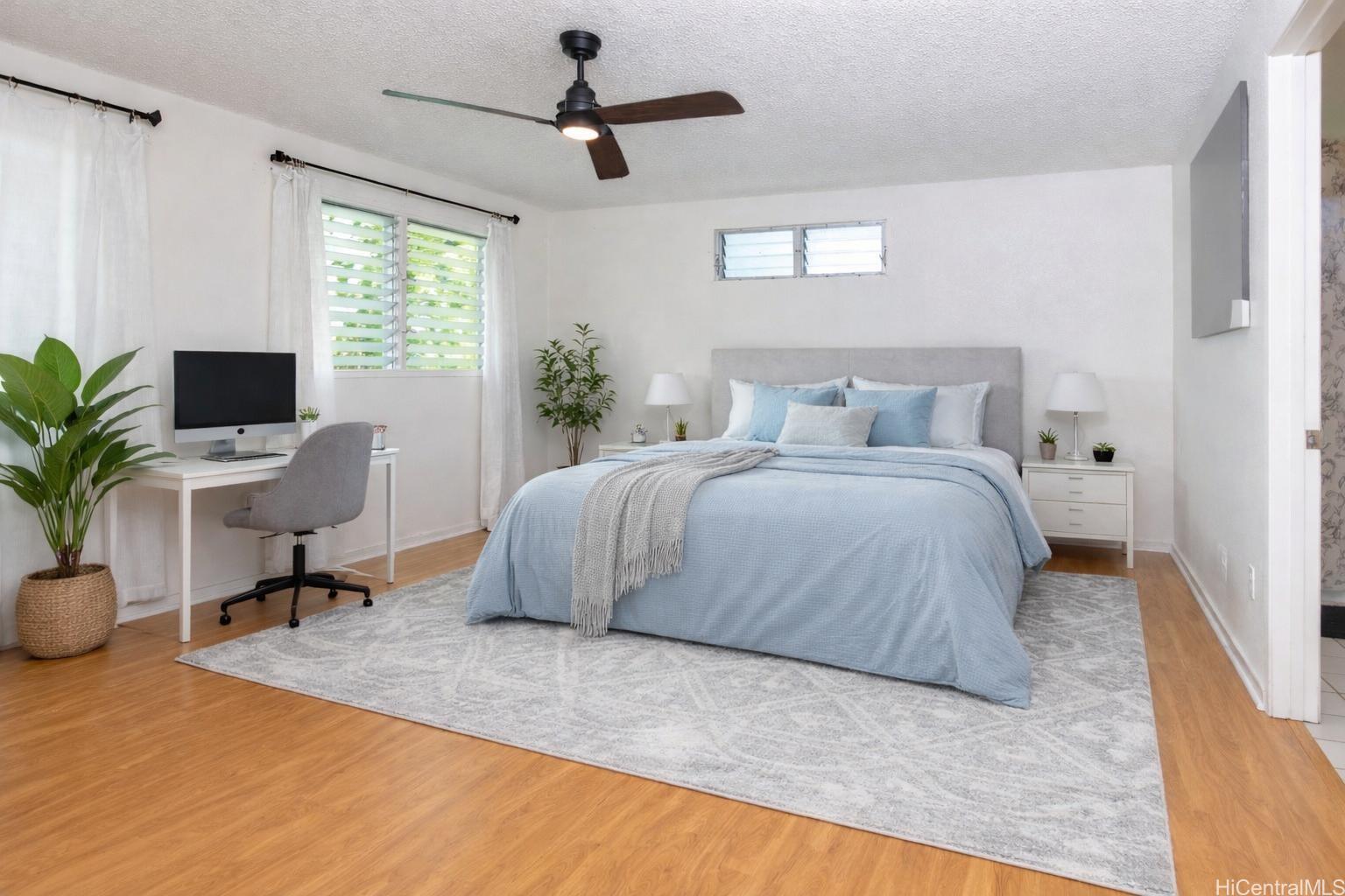 176 Kuulei Road Kailua, HI 96734 - Photo 7 of 24 Spacious primary bedroom. The room has been virtually staged.