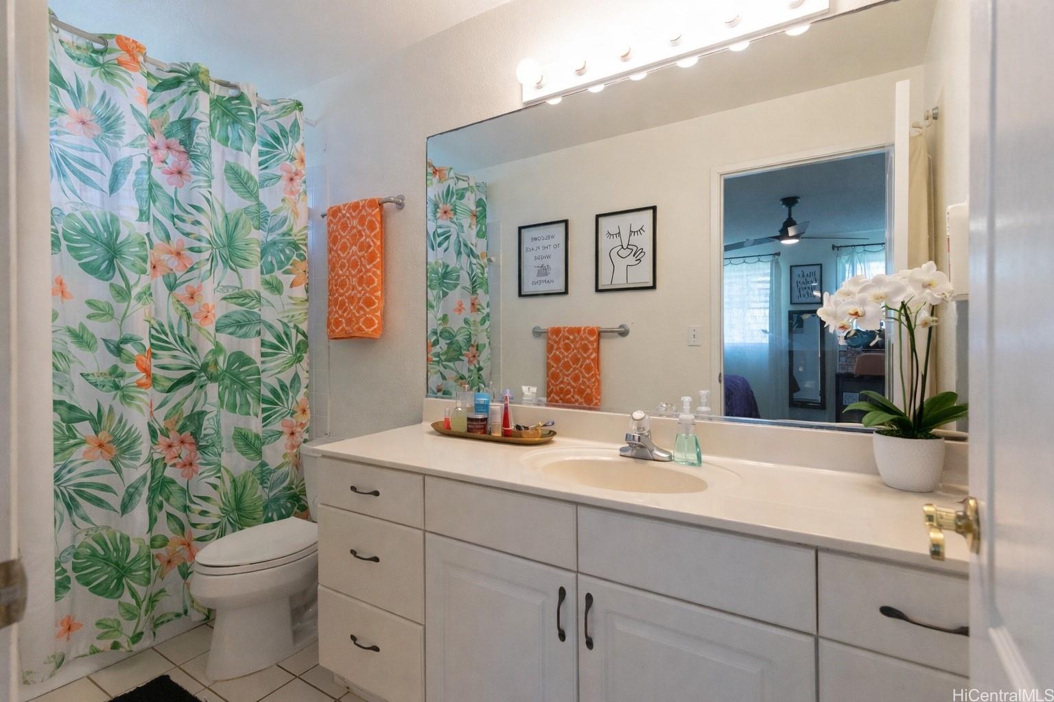 176 Kuulei Road Kailua, HI 96734 - Photo 8 of 24 Primary bathroom. The room has been virtually staged.