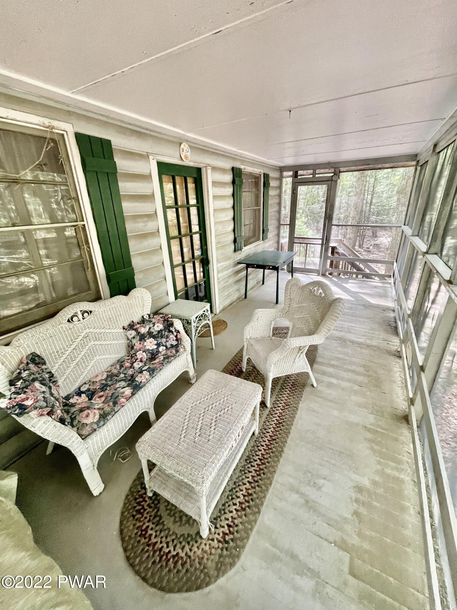 110 Seminole Road Shohola, PA 18458 - Photo 3 of 16 SCREENED IN PORCH