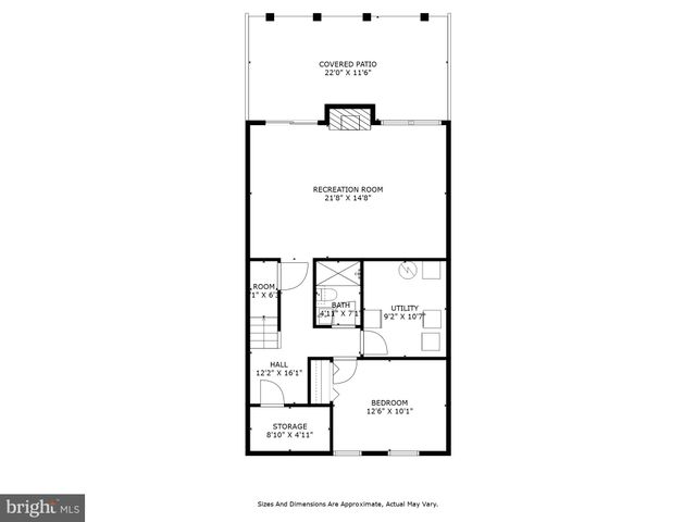 a view of a brick house with large windows