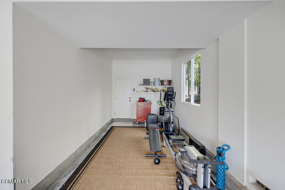 6103 Deerhill Road Oak Park, CA 91377 - Photo 31 of 40 a view of a room with gym equipment