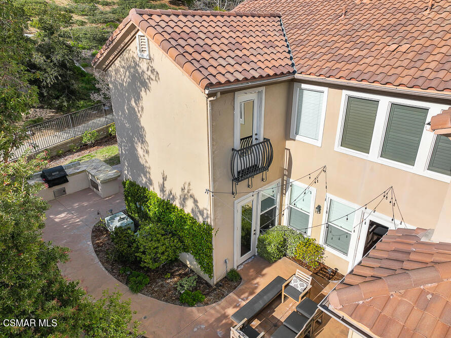 6103 Deerhill Road Oak Park, CA 91377 - Photo 34 of 40 a view of a house with a patio