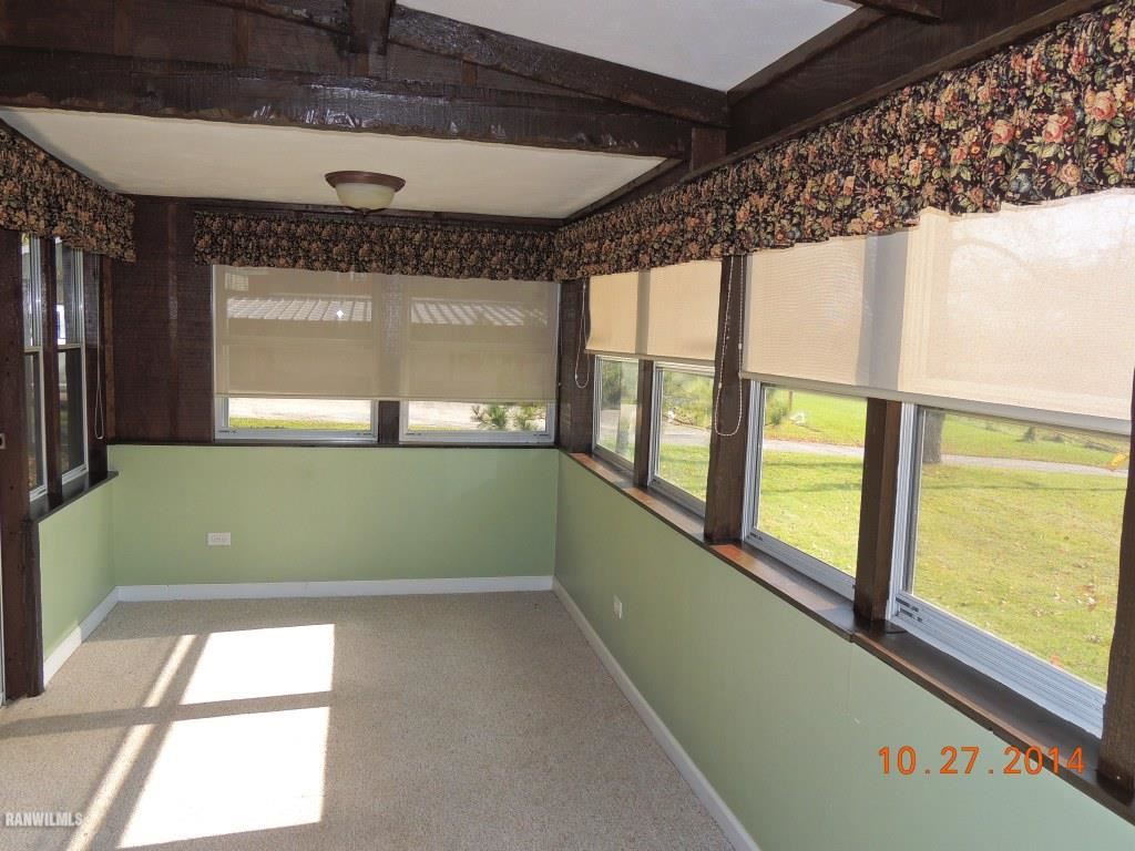 9691 Trask Bridge Road Pecatonica, IL 61063 - Photo 11 of 23 a view of an empty room with a window