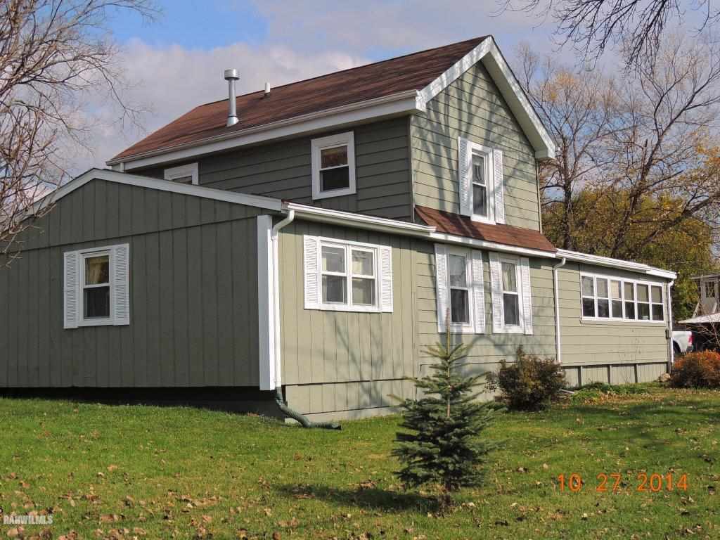 9691 Trask Bridge Road Pecatonica, IL 61063 - Photo 2 of 23 a view of a house with a yard