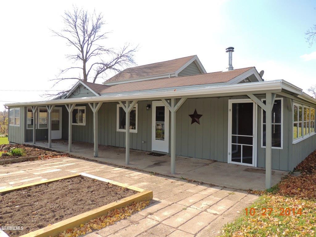 9691 Trask Bridge Road Pecatonica, IL 61063 - Photo 4 of 23 a view of a house with a rug