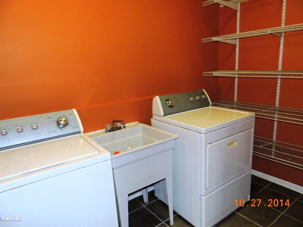 9691 Trask Bridge Road Pecatonica, IL 61063 - Photo 9 of 23 a utility room with dryer and washer