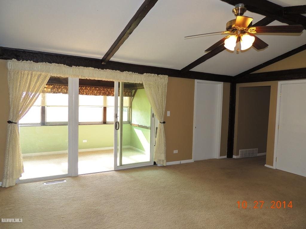 9691 Trask Bridge Road Pecatonica, IL 61063 - Photo 10 of 23 a view of an empty room with a window