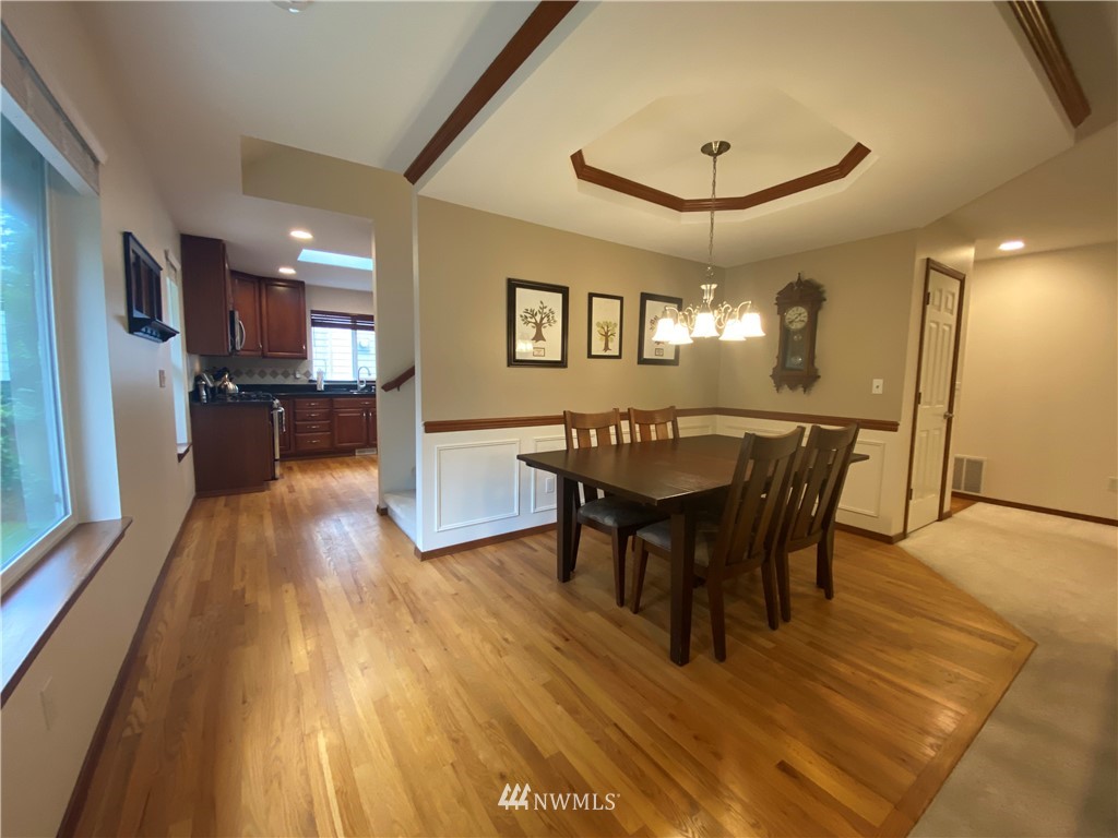 1815 Northeast 27th Court Renton, WA 98056 - Photo 10 of 31 a view of a dining room with furniture