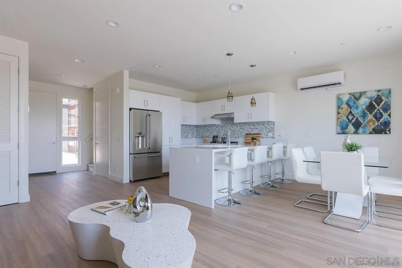 8292 High Street La Mesa, CA 91941 - Photo 2 of 23 a living room with furniture and kitchen view