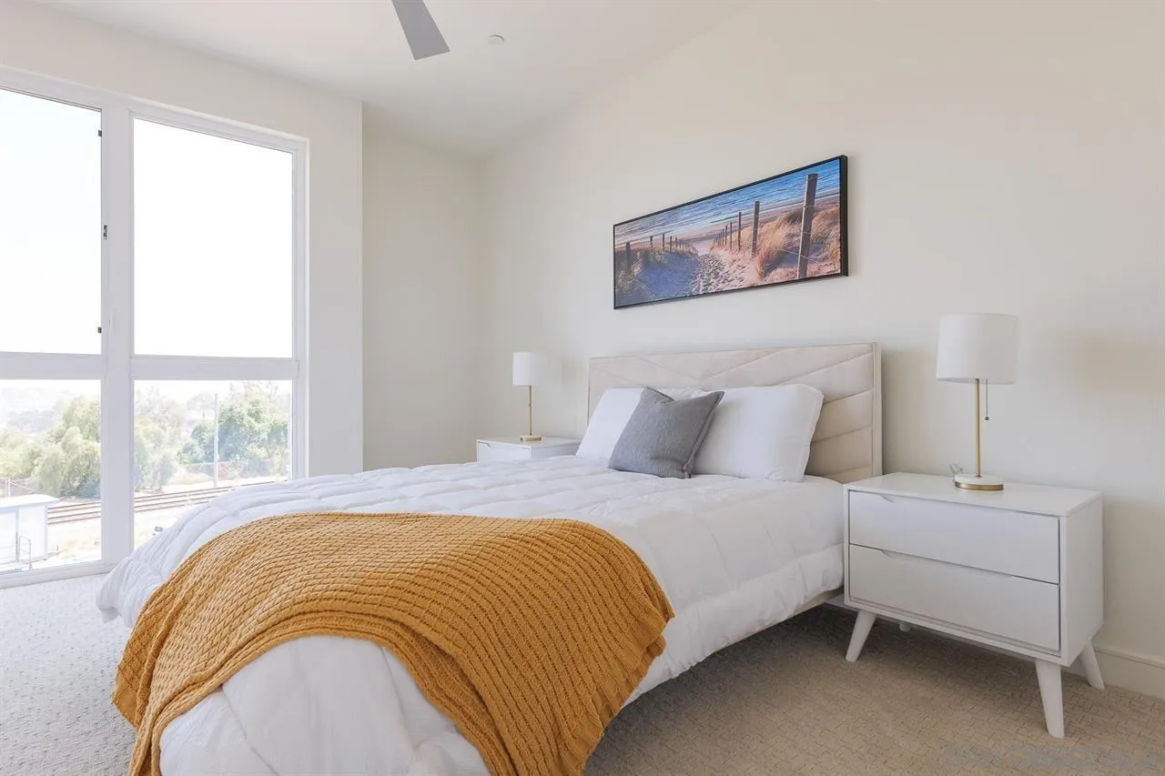 8292 High Street La Mesa, CA 91941 - Photo 10 of 23 a bedroom with a bed and a large window