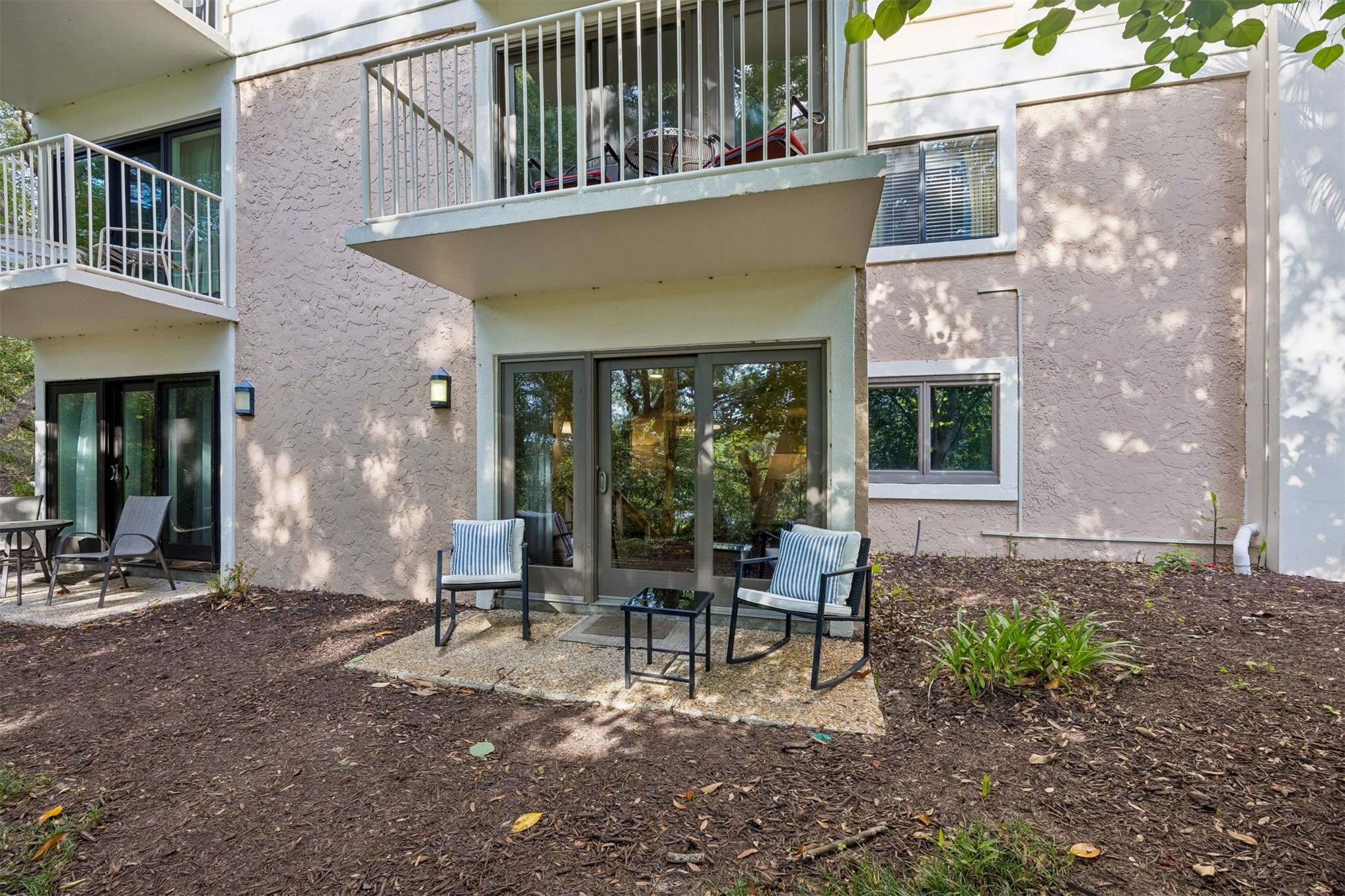 2014 Beachwood Road, Unit 2014 Amelia Island, FL 32034 - Photo 22 of 36 a garden view with a outdoor seating space