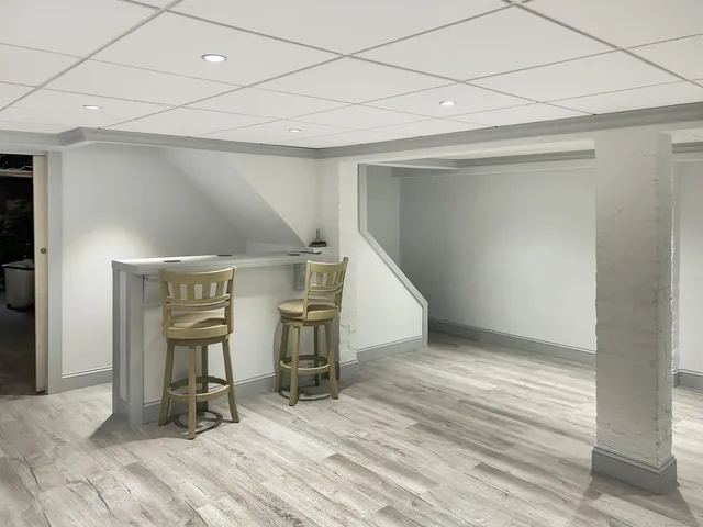 a view of a livingroom with chairs