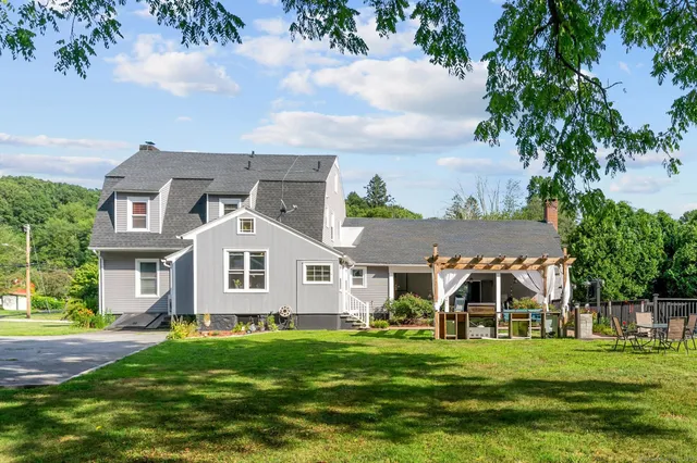 front view of a house with a yard