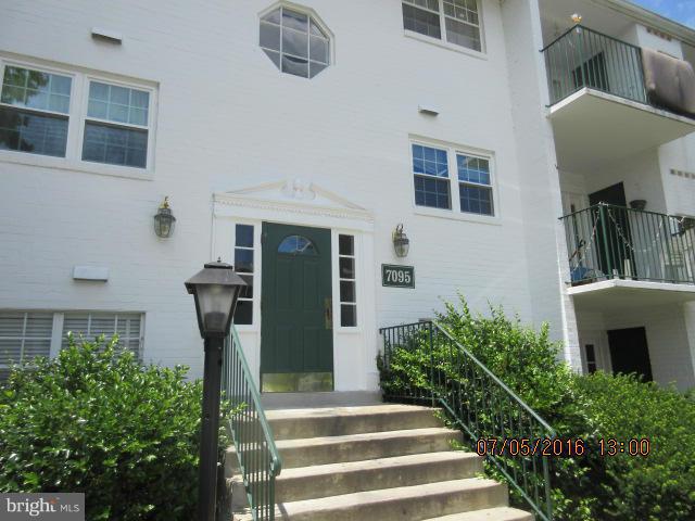 7095 Spring Garden Drive, Unit 3 Springfield, VA 22150 - Photo 1 of 6 a front view of a house with plants