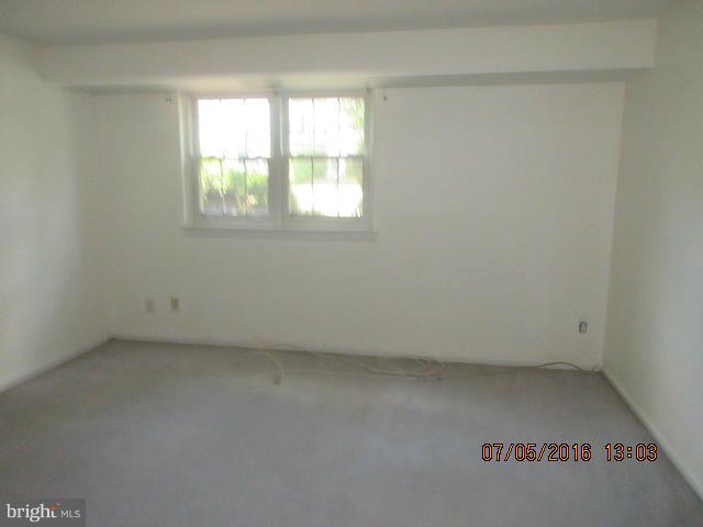 7095 Spring Garden Drive, Unit 3 Springfield, VA 22150 - Photo 6 of 6 an empty room with a window