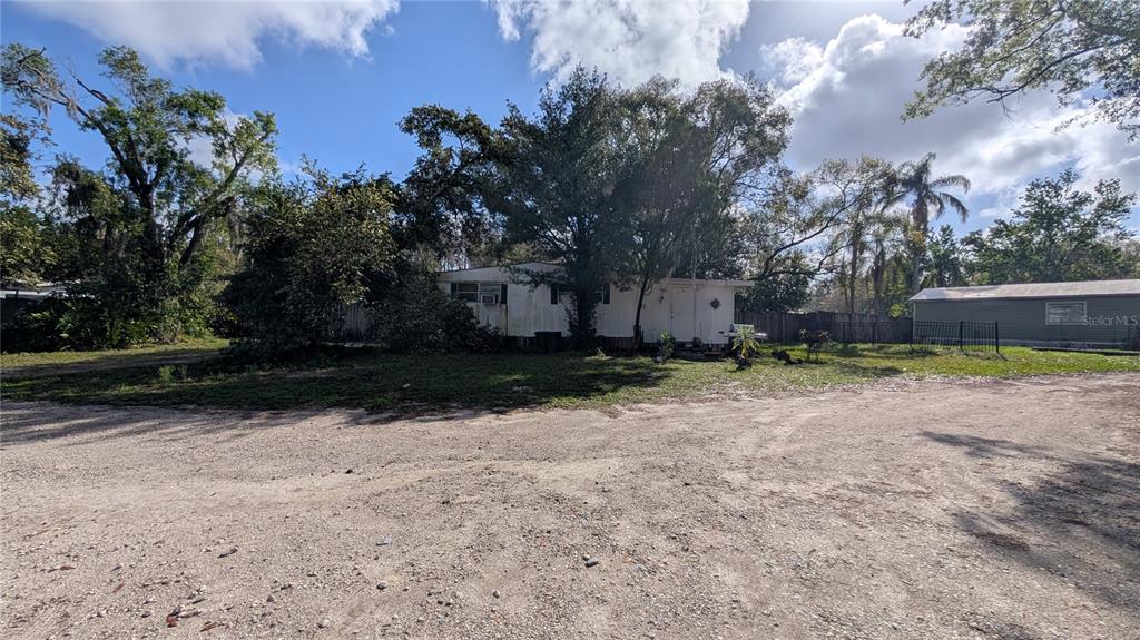 1960 Andrews Loop Lutz, FL 33558 - Photo 2 of 3 a view of backyard with green space