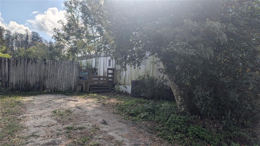 1960 Andrews Loop Lutz, FL 33558 - Photo 3 of 3 a view of a backyard
