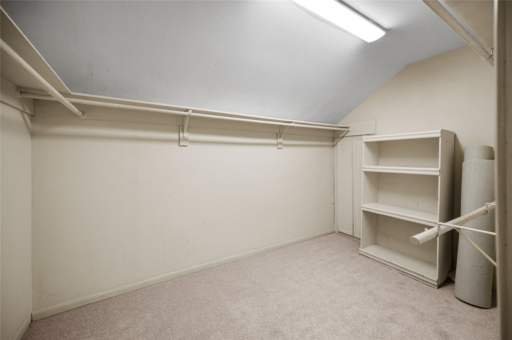 705 Davis Road League City, TX 77573 - Photo 15 of 26 Primary walk in closet with tons of room for all of your storage needs.