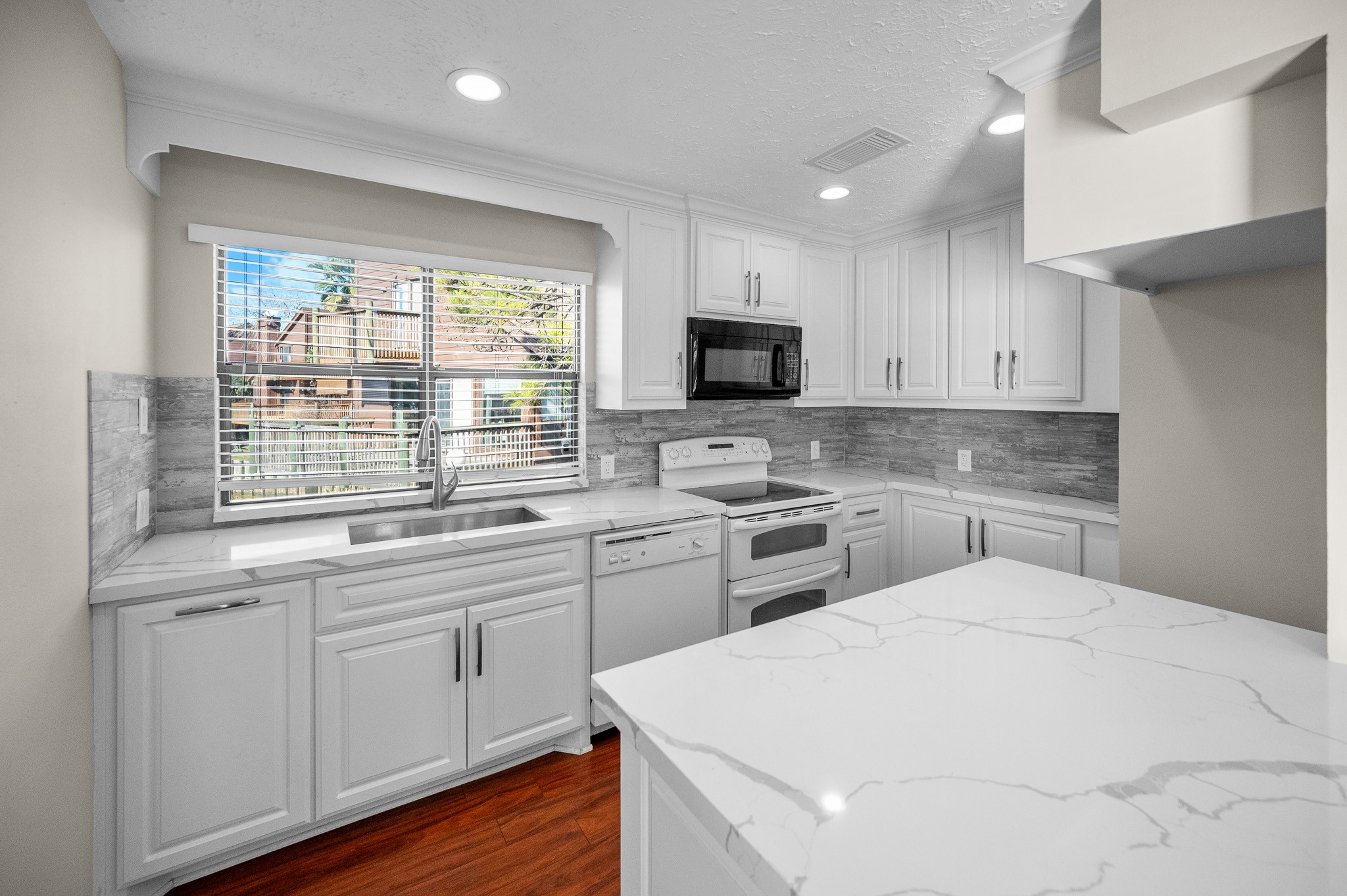 705 Davis Road League City, TX 77573 - Photo 5 of 26 Look at this stunning kitchen space with views for days!