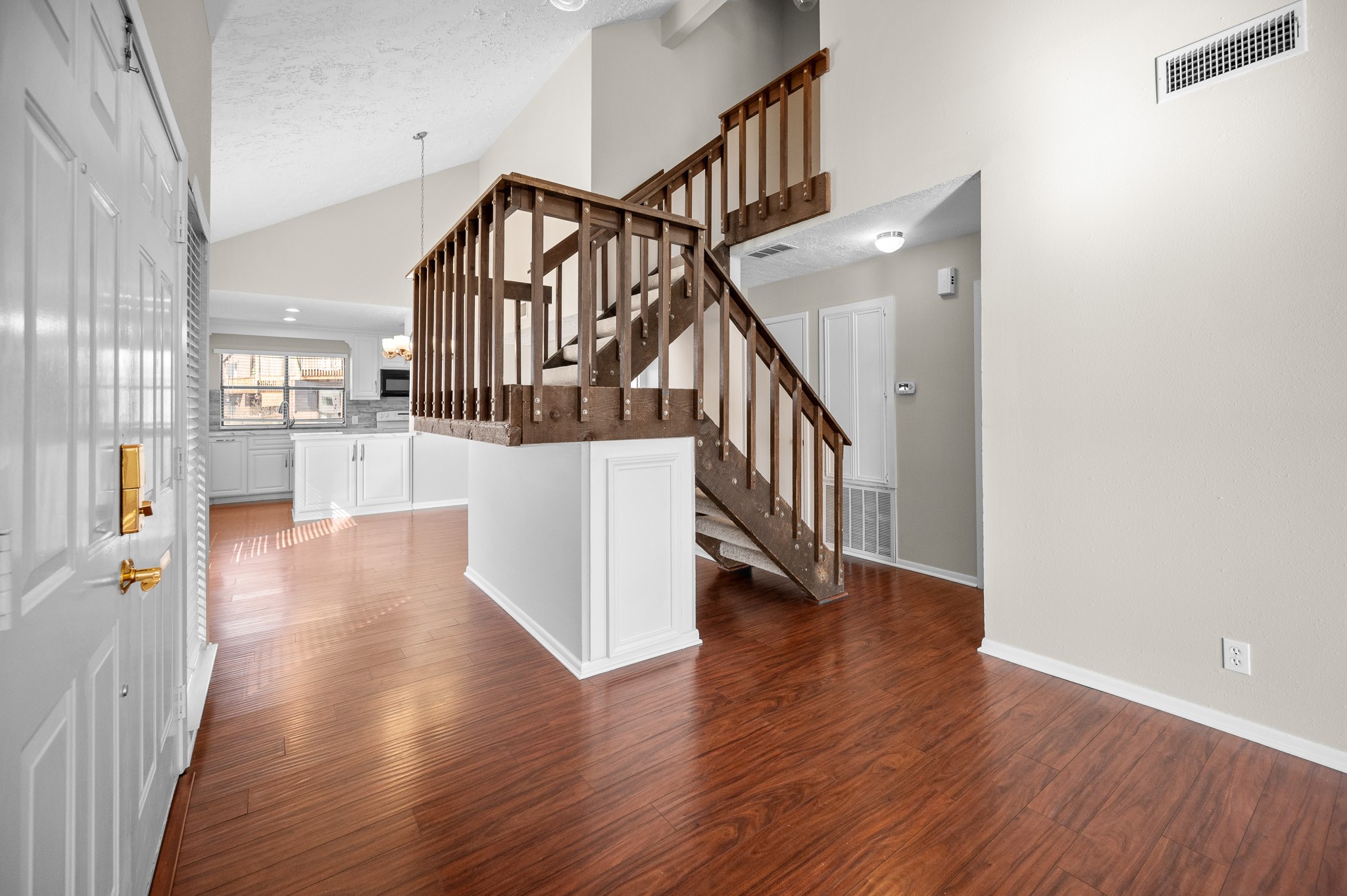 705 Davis Road League City, TX 77573 - Photo 8 of 26 The high ceilings in this home makes the space open and spacious.