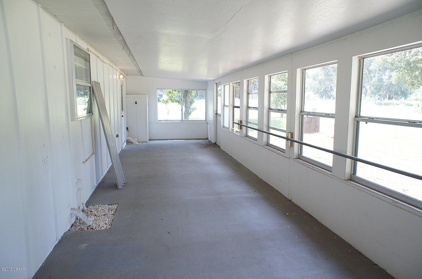 4572 Tree Top Lane Edgewater, FL 32141 - Photo 23 of 24 Florida Room