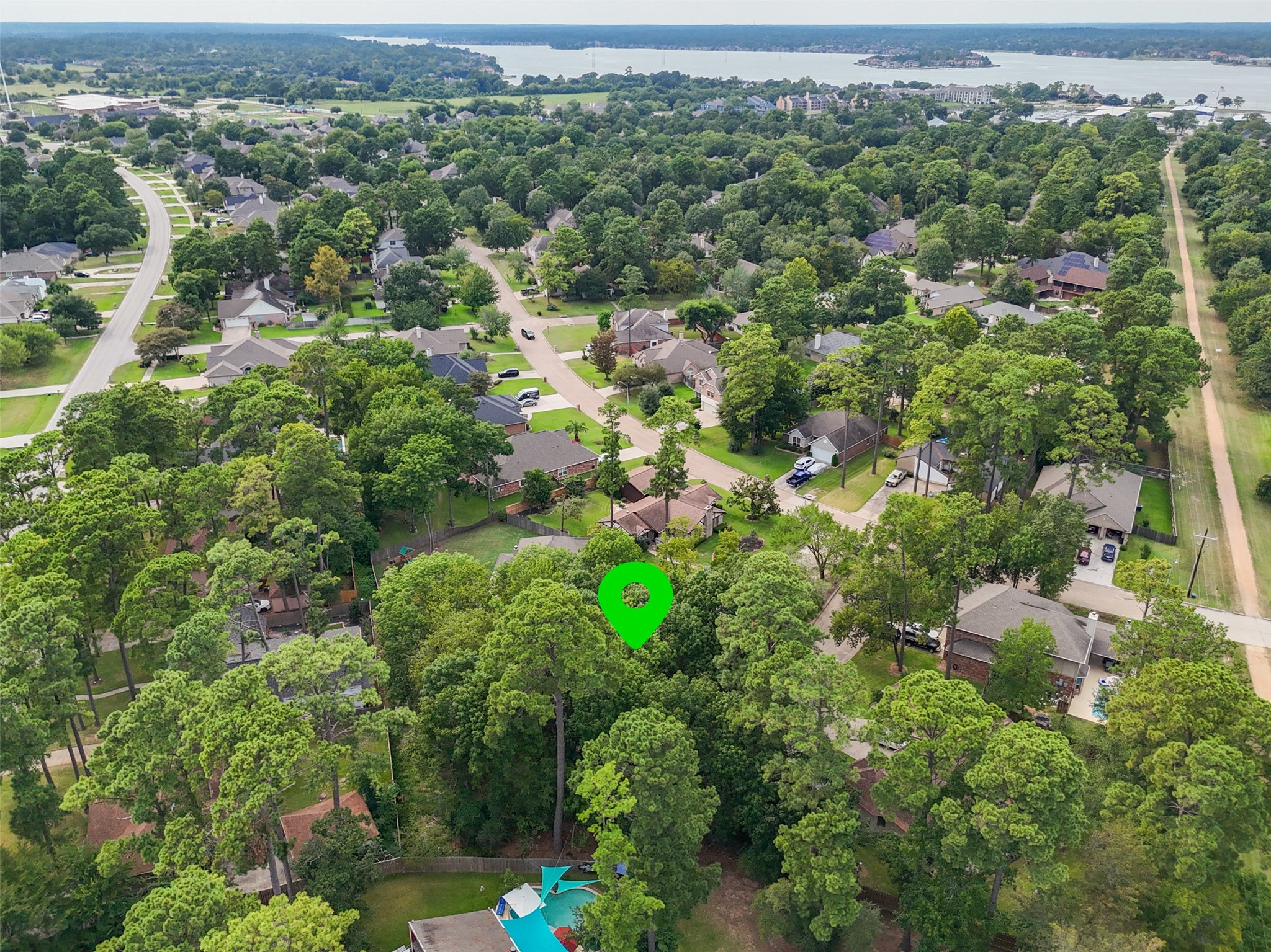 3403 Concord Circle Montgomery, TX 77356 - Photo 3 of 17 an aerial view of a houses with a yard