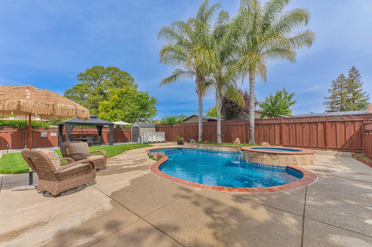 1239 Ayer Drive Gilroy, CA 95020 - Photo 24 of 39 a swimming pool with outdoor seating and yard