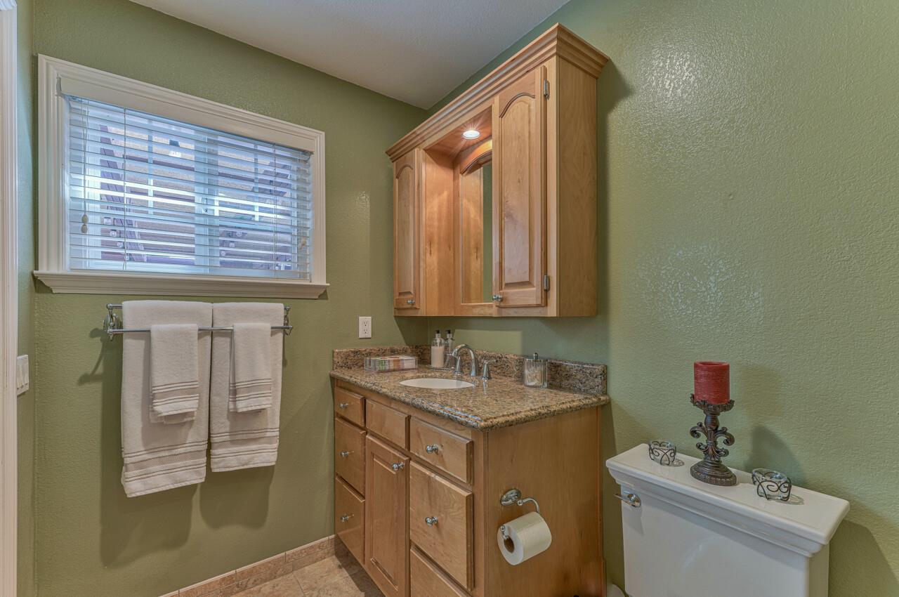 1239 Ayer Drive Gilroy, CA 95020 - Photo 29 of 39 a bathroom with a sink and a mirror