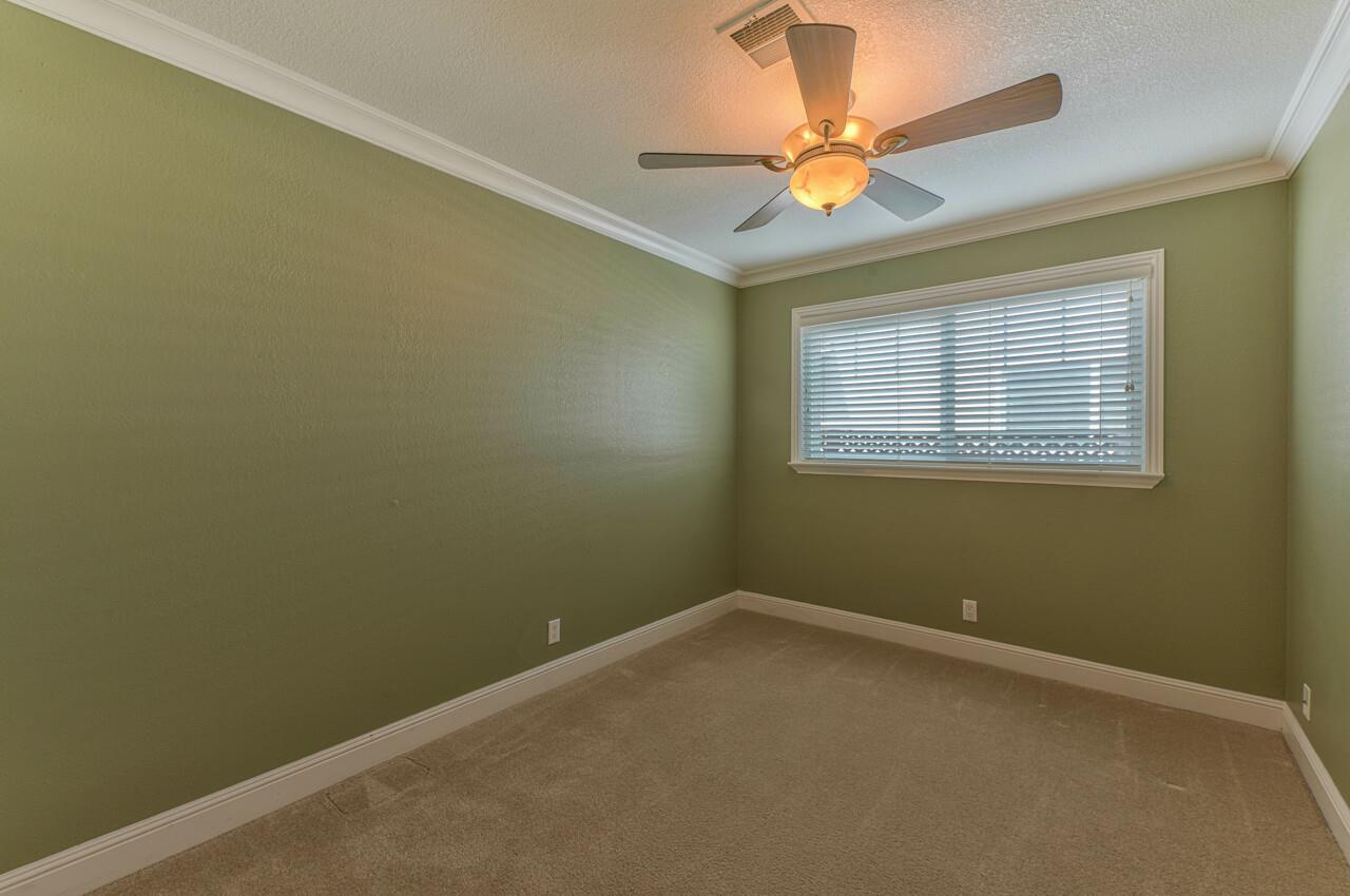 1239 Ayer Drive Gilroy, CA 95020 - Photo 33 of 39 an empty room with a window and a fan