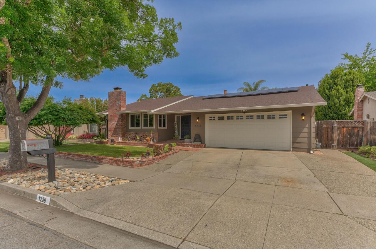 1239 Ayer Drive Gilroy, CA 95020 - Photo 38 of 39 a view of a house with a garden and pathway