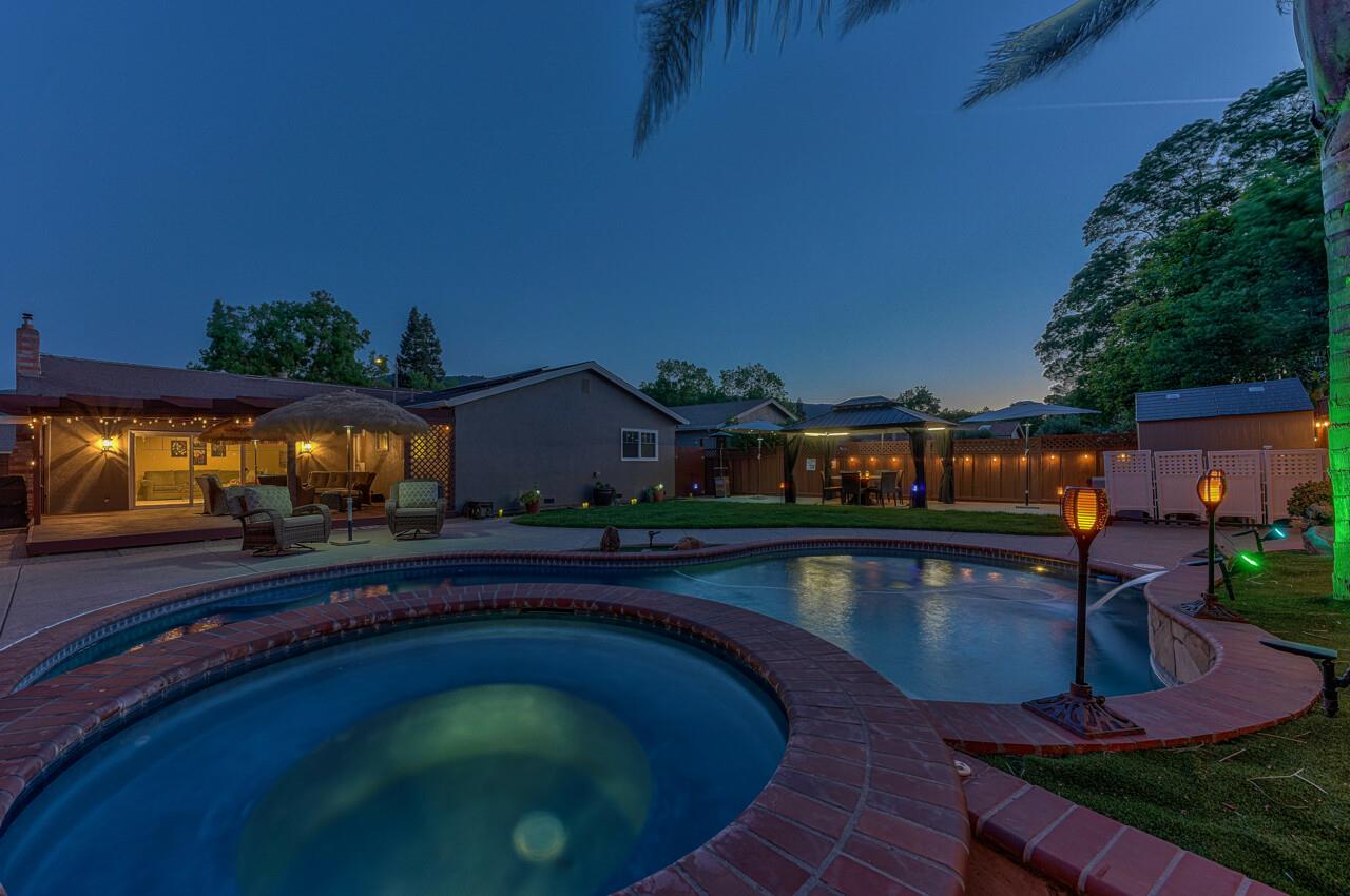 1239 Ayer Drive Gilroy, CA 95020 - Photo 4 of 39 a swimming pool view with a seating space
