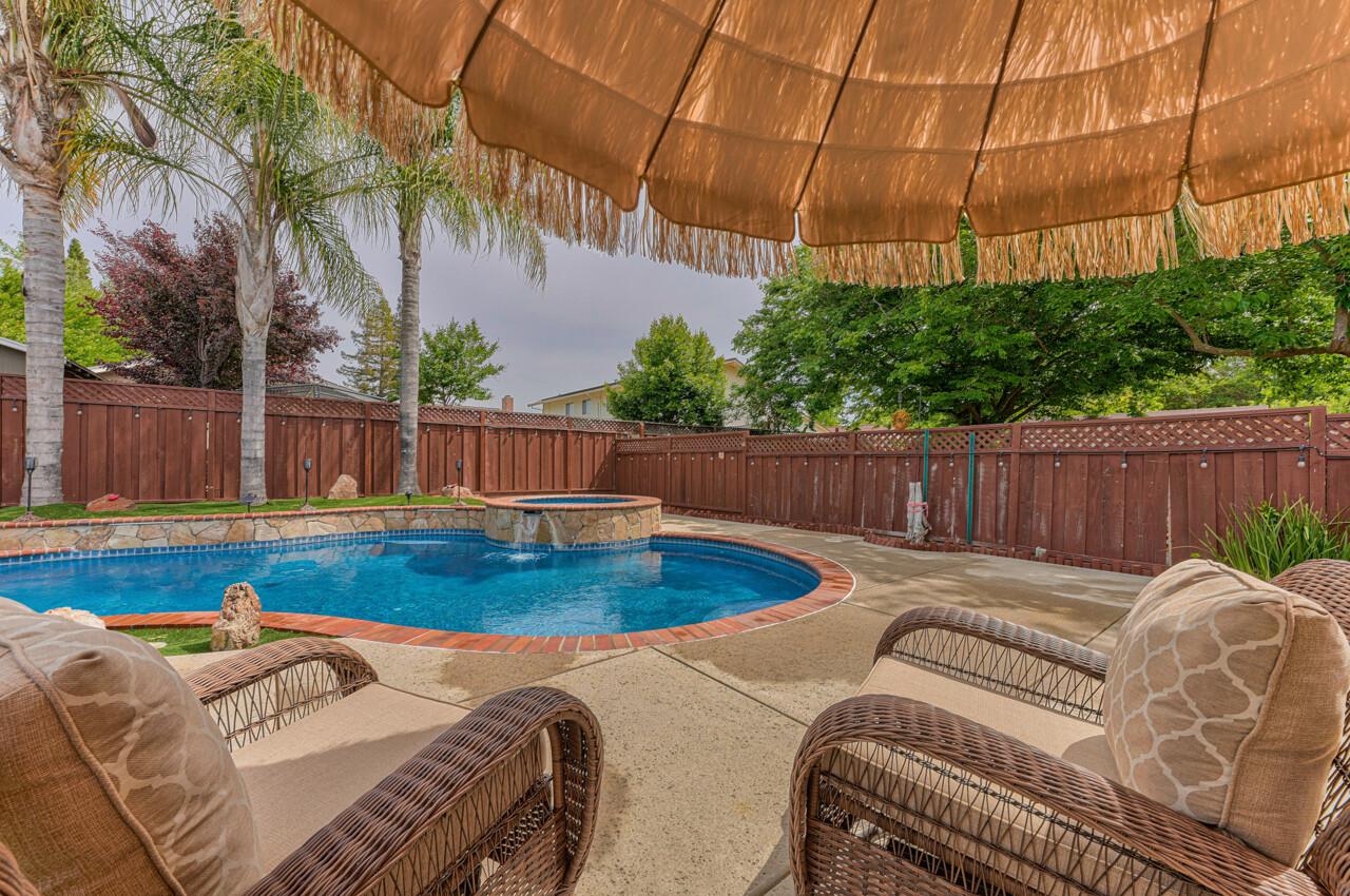 1239 Ayer Drive Gilroy, CA 95020 - Photo 5 of 39 a view of a backyard with swimming pool
