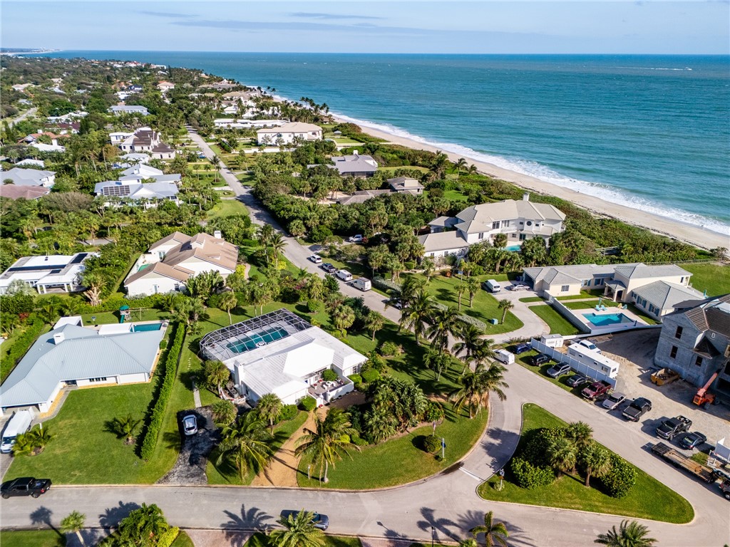 935 Reef Road Vero Beach, FL 32963 - Photo 4 of 4 an aerial view of residential houses with outdoor space