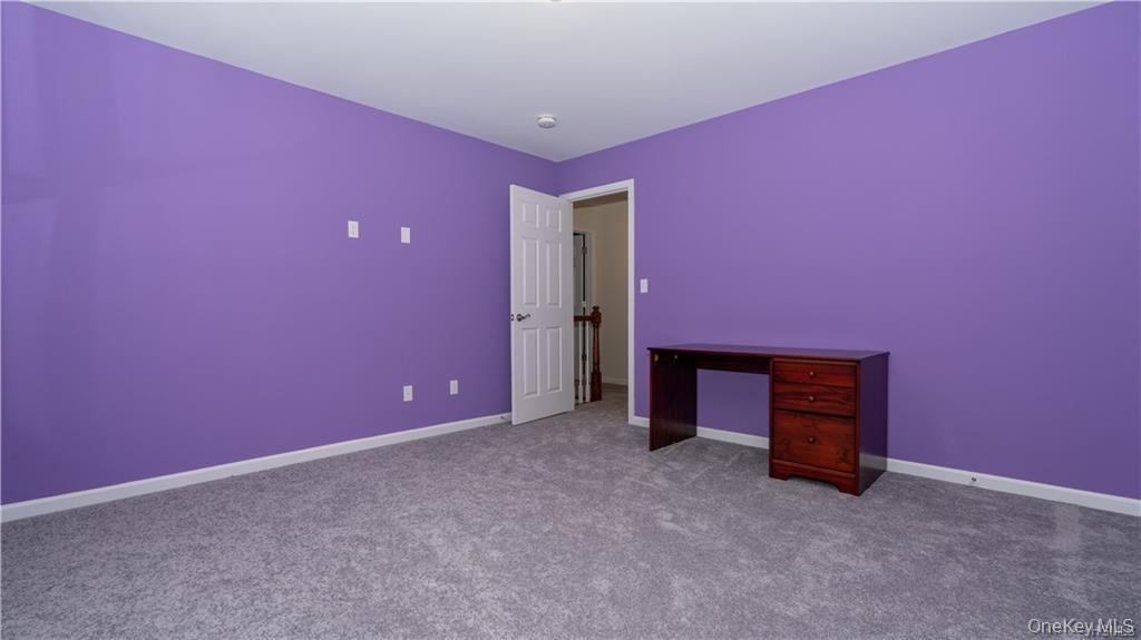 5 Harrier Ridge Drive Wallkill, NY 12589 - Photo 22 of 33 Unfurnished bedroom with baseboards and carpet floors