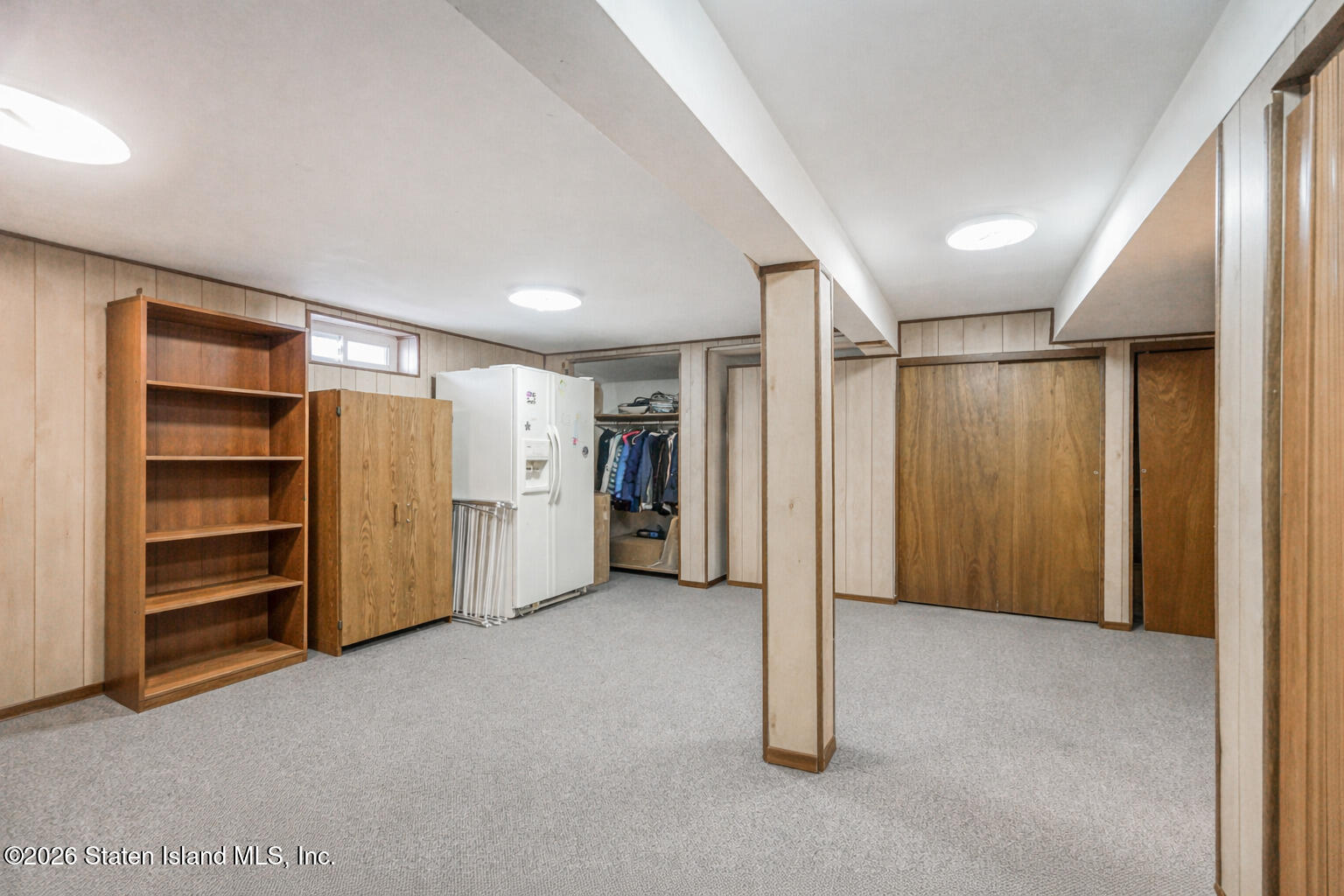 76 Berry Avenue Staten Island, NY 10312 - Photo 23 of 42 a view of empty room with refrigerator and closet