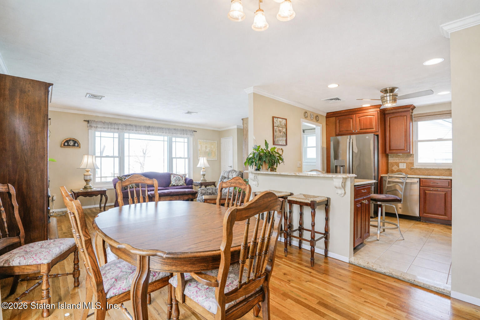 76 Berry Avenue Staten Island, NY 10312 - Photo 7 of 42 a view of a a dining room with furniture window and outside view