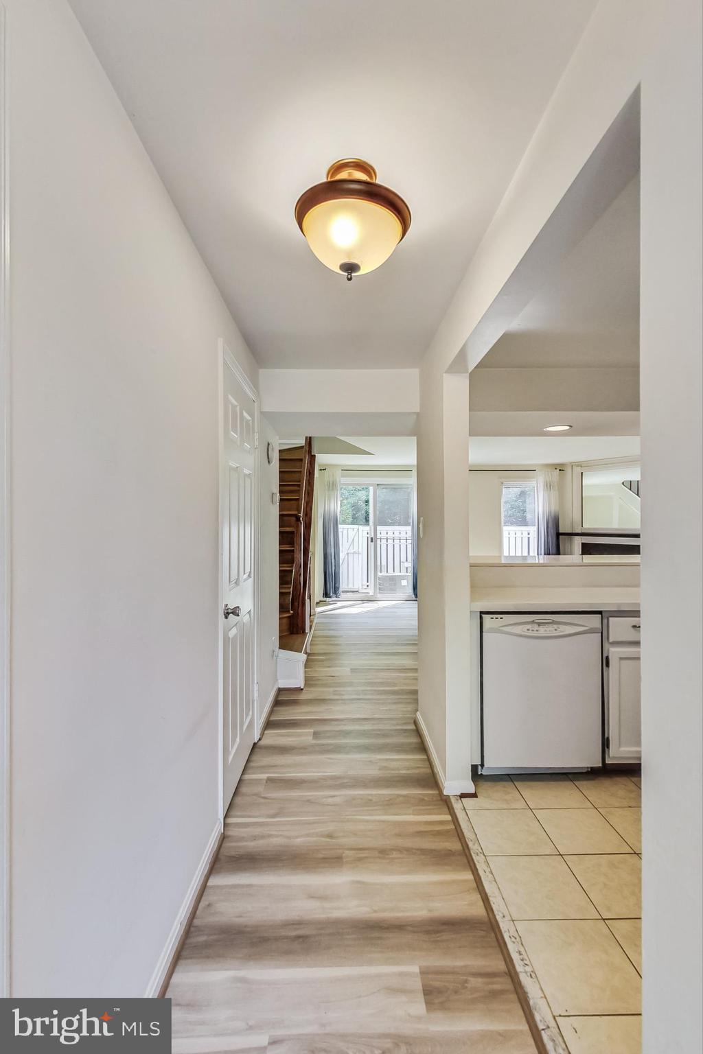 11924 Redtree Way Reston, VA 20194 - Photo 3 of 31 a view of a hallway that has closet and a window