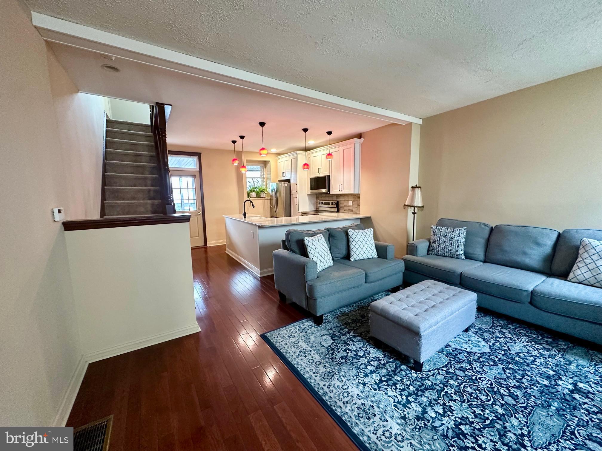 3922 Manor Street Philadelphia, PA 19128 - Photo 2 of 30 a living room with furniture and wooden floor