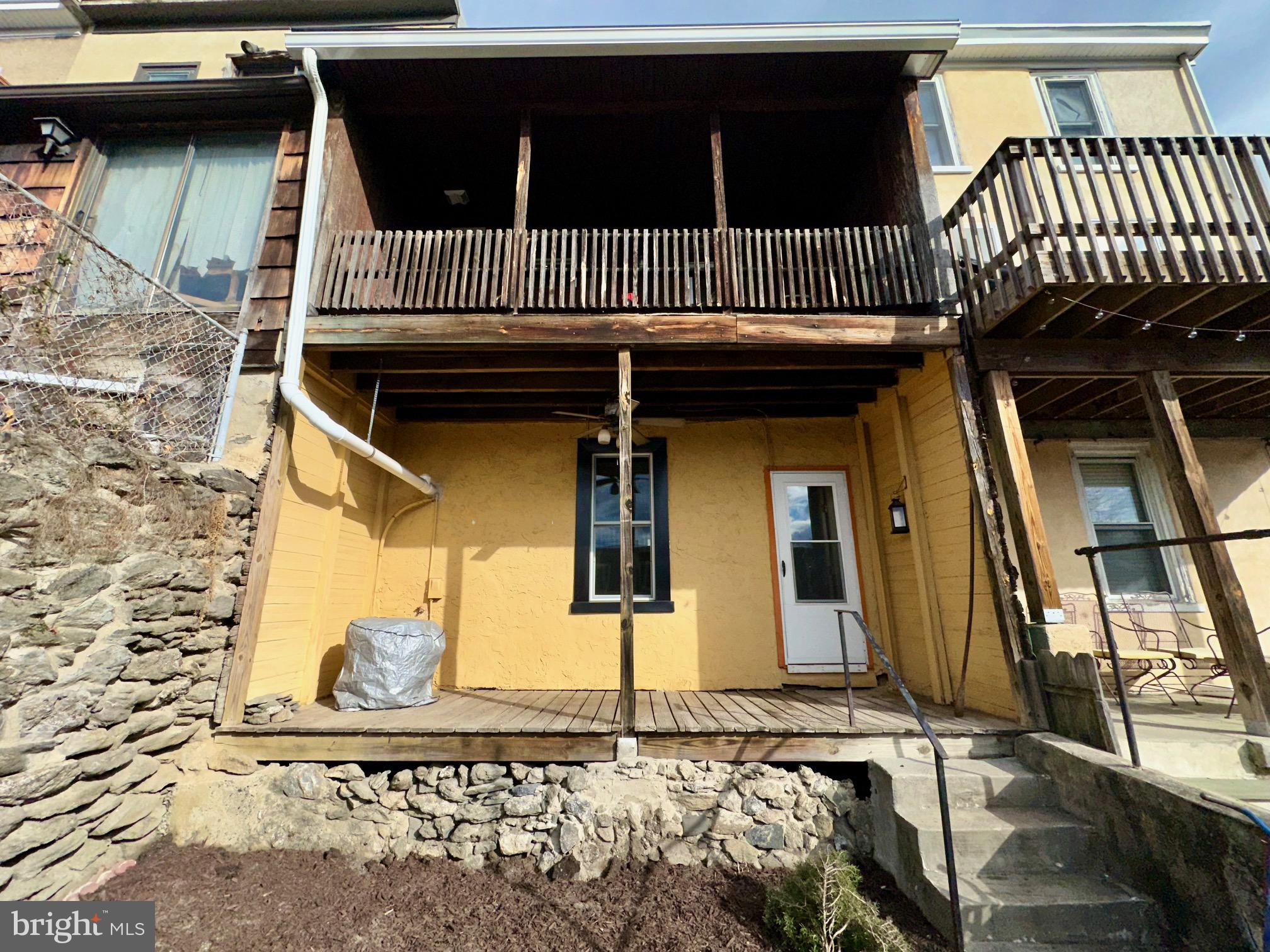 3922 Manor Street Philadelphia, PA 19128 - Photo 28 of 30 a front view of a house with wooden fence