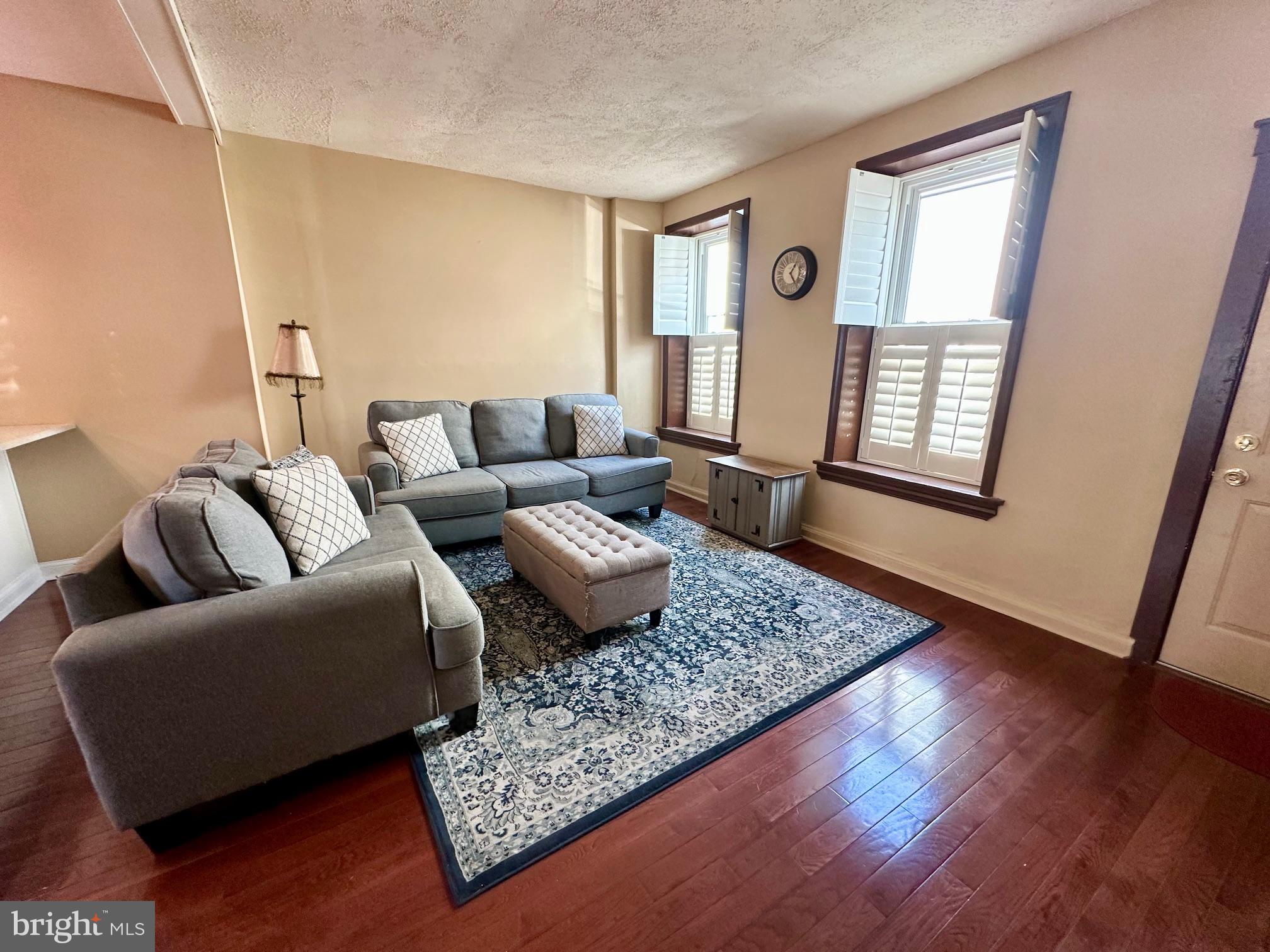 3922 Manor Street Philadelphia, PA 19128 - Photo 4 of 30 a living room with furniture and wooden floor